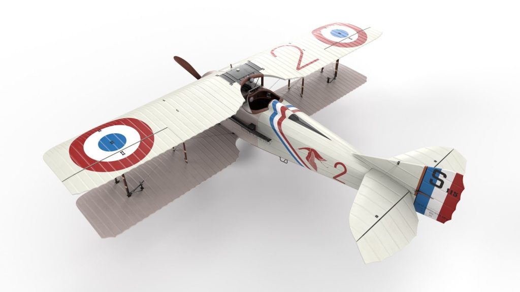 A toy airplane with a propeller on a white background