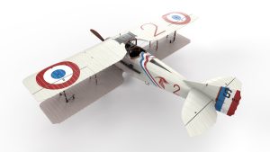 A toy airplane with a propeller on a white background