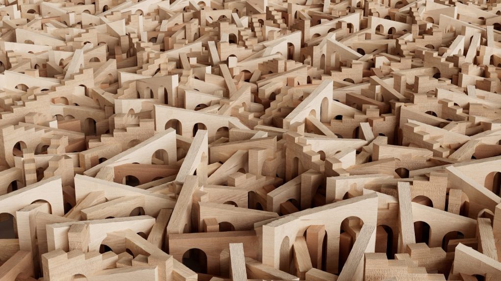 A chaotic landscape of wooden building blocks.