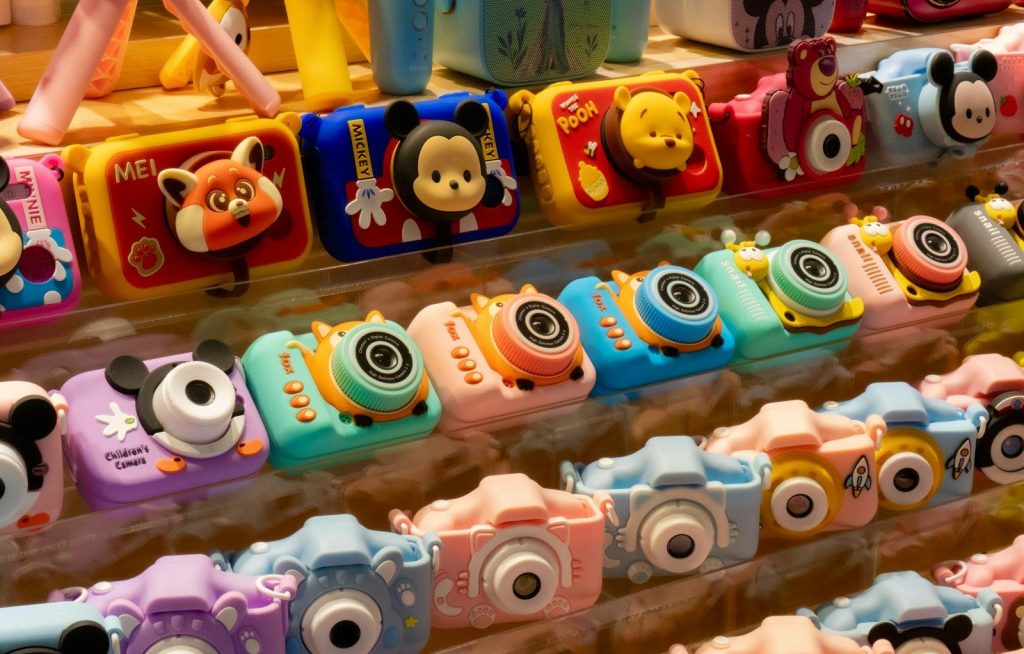 a display of various toy cameras in a store
