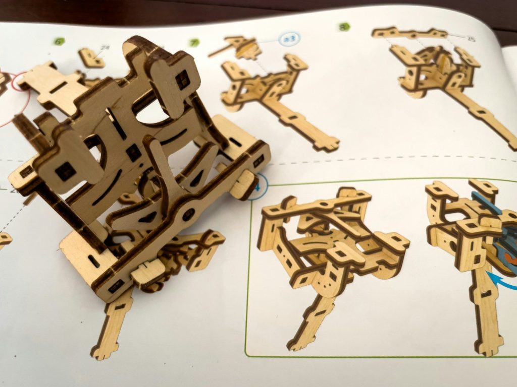 Close-up of intricate laser-cut wooden puzzle pieces showcasing high precision